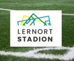 Logo Lernort Stadion auf Rasenfläche Logo Lernort Stadion auf Rasenfläche
