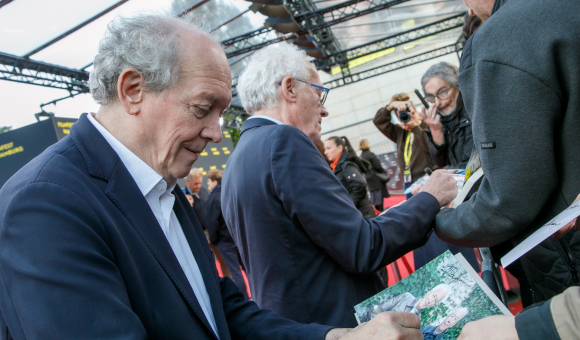 Die Brüder Dardenne mit Autogrammjägern